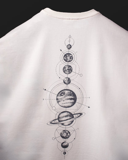 Full back view of the DVYNDRIP Creator T-shirt featuring a vertical cosmic planet diagram graphic